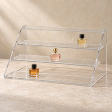 Four-Step Perfume Display Riser in clear acrylic, in use