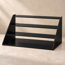 Four-Step Perfume Display Riser in black acrylic, empty
