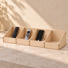 Bedside Remote and Phone Caddy in wood (birch plywood), in use