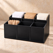 Sugar Sachet and Stirrer Caddy in black acrylic, in use