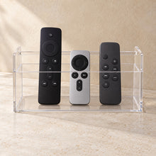 Remote Control Organiser in clear acrylic, in use