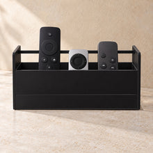 Remote Control Organiser in black acrylic, in use