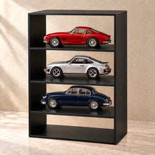 Collectible Display Case with Shelves in black acrylic, in use