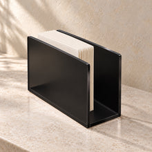 Napkin Holder in black acrylic, in use