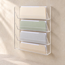 Wall-Mounted Document Pocket Rack in clear acrylic, in use