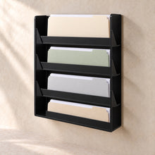 Wall-Mounted Document Pocket Rack in black acrylic, in use