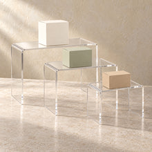 Display Riser Set of Three in clear acrylic, in use