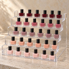 Five-Tier Nail Polish Display Rack in clear acrylic, in use