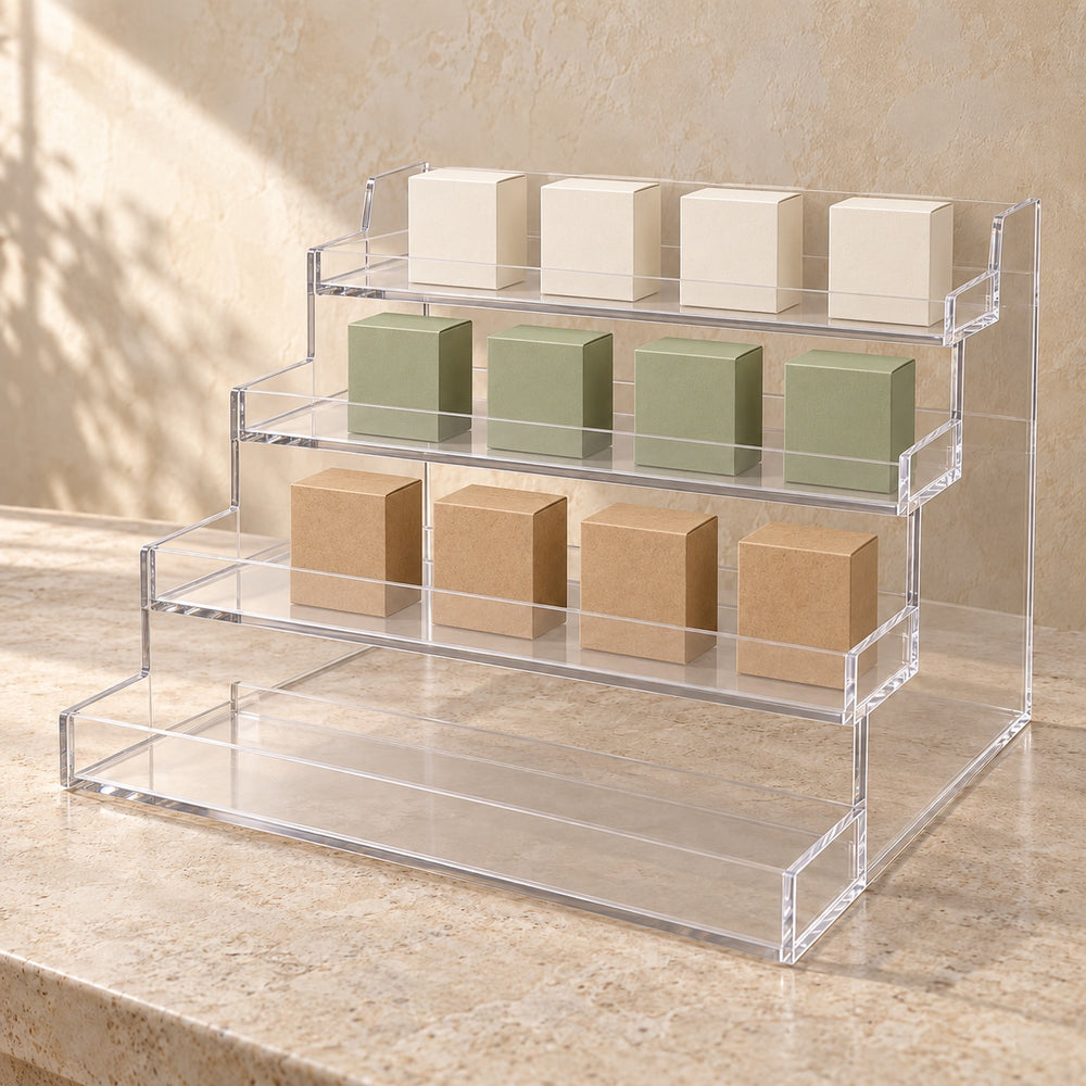 Four-Tier Retail Product Display in clear acrylic, in use