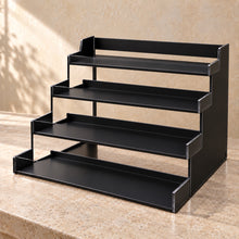Four-Tier Retail Product Display in black acrylic, empty