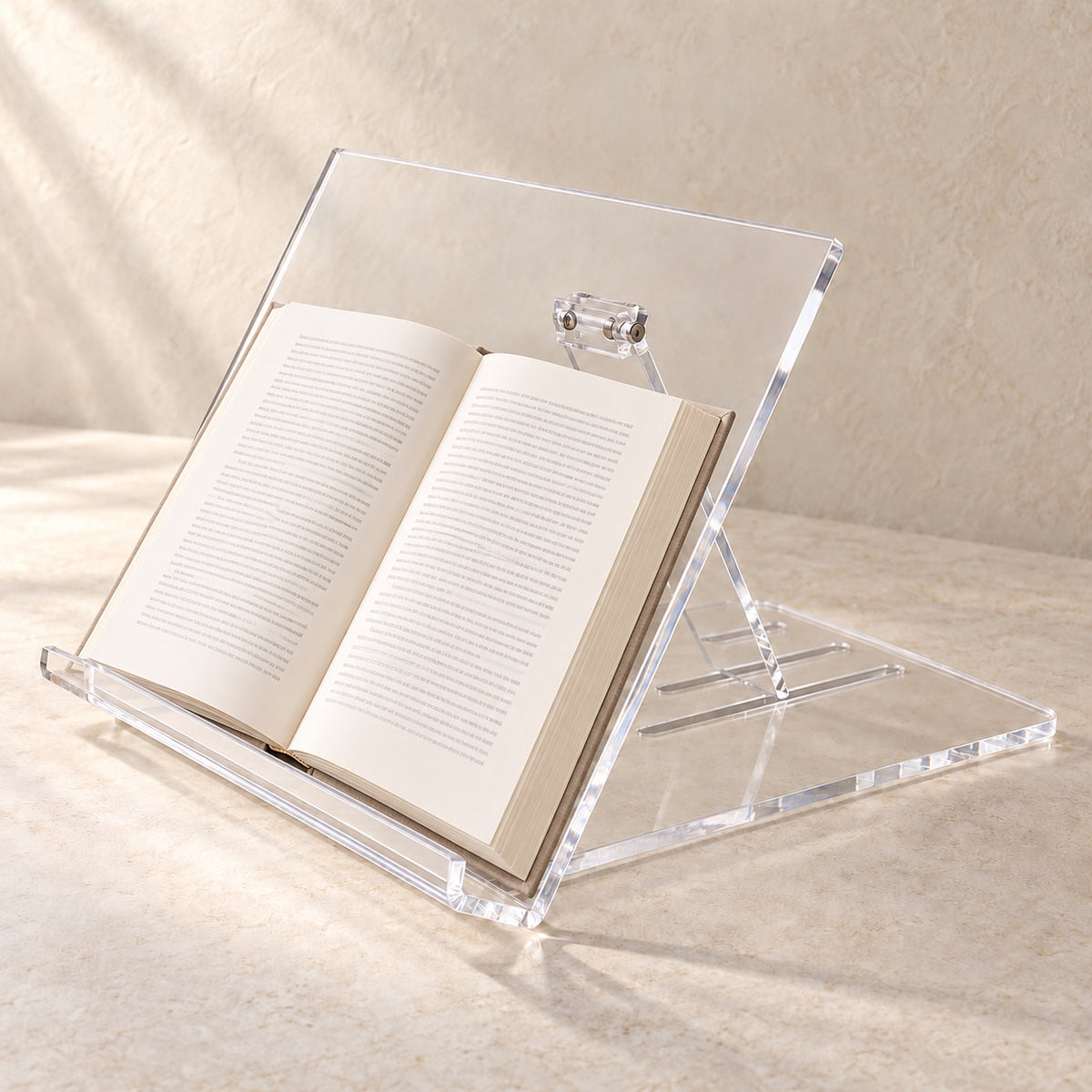 Adjustable Book and Tablet Reading Stand in clear acrylic, in use