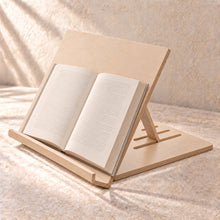 Adjustable Book and Tablet Reading Stand in wood (birch plywood), in use