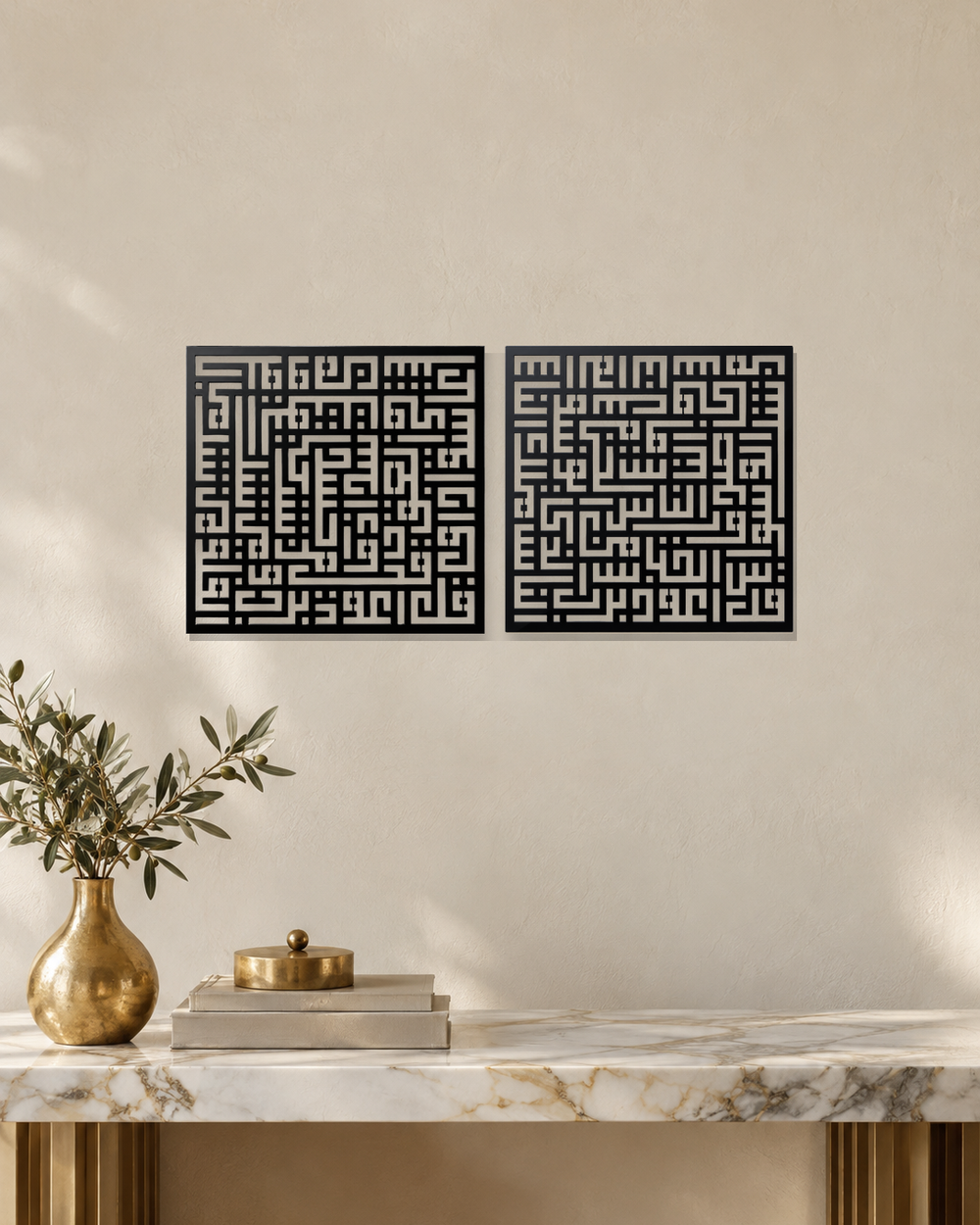 Set of two square Kufic acrylic panels, Surah Al-Falaq and Surah An-Nas, in gloss piano black, float-mounted side by side on a pale wall.