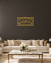 Bismillah ar-Rahman ar-Raheem acrylic wall art in mirror gold, Thuluth calligraphy in an ornamental cartouche with an eight-point star border, float-mounted on a dark wall