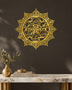 Panjtan Pak round acrylic medallion in mirror gold, float-mounted on a dark espresso wall