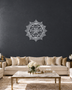 Panjtan Pak round acrylic medallion in mirror silver, float-mounted on a cool graphite wall