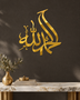 Alhamdulillah Arabic calligraphy wall art in mirror gold acrylic, float-mounted on a dark wall