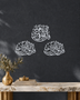 Mirror silver chrome acrylic Three Quls wall art, three Arabic calligraphy clusters float-mounted in a triangular composition.