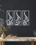 Set of three narrow vertical acrylic wall panels in mirror chrome silver, each framing a single Arabic word in tall flowing calligraphy, float-mounted in a row on a pale wall.