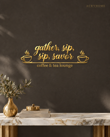 Coffee & Tea Lounge Wall Sign with Cups in mirror gold acrylic, float-mounted on a deep charcoal wall.