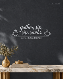 Coffee & Tea Lounge Wall Sign with Cups in mirror silver acrylic, float-mounted on a deep graphite wall.
