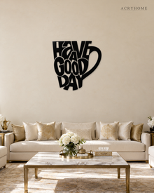Have a Good Day Mug Silhouette Wall Art in gloss piano black acrylic, float-mounted on a pale ivory wall.