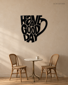 Have a Good Day Mug Silhouette Wall Art in gloss piano black acrylic, float-mounted on a pale ivory wall.