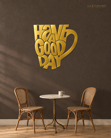 Have a Good Day Mug Silhouette Wall Art in mirror gold acrylic, float-mounted on a deep charcoal wall.