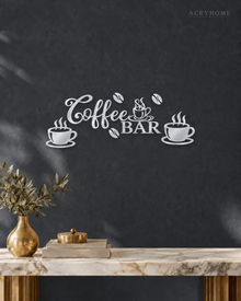 Coffee Bar Wall Sign with Cups and Beans for Kitchens in mirror silver acrylic, float-mounted on a deep graphite wall.