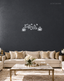 Coffee Bar Wall Sign with Cups and Beans for Kitchens in mirror silver acrylic, float-mounted on a deep graphite wall.