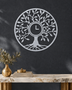 Tree of Life wall clock in mirror chrome silver acrylic, circular leaf and branch cut work with the clock hands at the centre of the trunk.