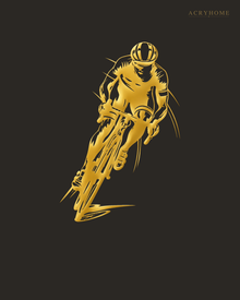 Road Cyclist in Full Sprint Wall Art for Home Gyms in mirror gold acrylic, float-mounted on a deep charcoal wall.