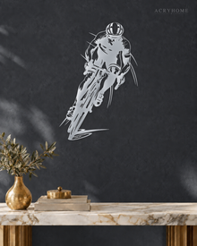 Road Cyclist in Full Sprint Wall Art for Home Gyms in mirror silver acrylic, float-mounted on a deep graphite wall.
