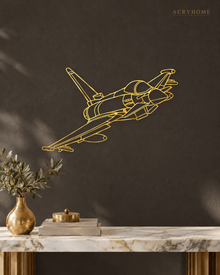 Fighter Jet Wall Art, Climbing Aircraft Outline in mirror gold acrylic, float-mounted on a deep charcoal wall.