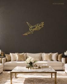 Fighter Jet Wall Art, Climbing Aircraft Outline in mirror gold acrylic, float-mounted on a deep charcoal wall.