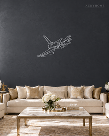 Fighter Jet Wall Art, Climbing Aircraft Outline in mirror silver acrylic, float-mounted on a deep graphite wall.