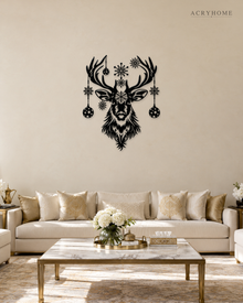 Stag Head Christmas Wall Art with Hanging Baubles and Snowflakes in gloss piano black acrylic, float-mounted on a pale ivory wall.