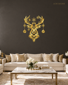 Stag Head Christmas Wall Art with Hanging Baubles and Snowflakes in mirror gold acrylic, float-mounted on a deep charcoal wall.