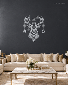 Stag Head Christmas Wall Art with Hanging Baubles and Snowflakes in mirror silver acrylic, float-mounted on a deep graphite wall.