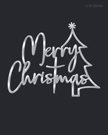 Merry Christmas Script Wall Sign with Outline Tree in mirror silver acrylic, float-mounted on a deep graphite wall.