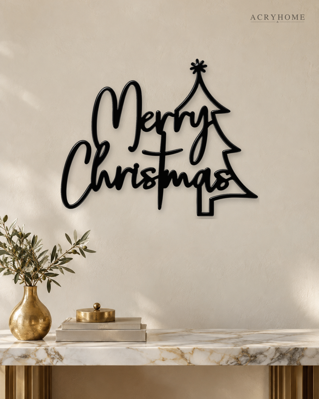 Merry Christmas Script Wall Sign with Outline Tree in gloss piano black acrylic, float-mounted on a pale ivory wall.