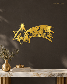 Nativity Scene Wall Art with a Sweeping Comet Star in mirror gold acrylic, float-mounted on a deep charcoal wall.
