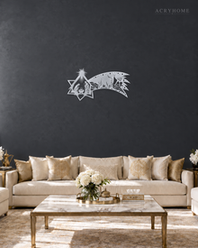 Nativity Scene Wall Art with a Sweeping Comet Star in mirror silver acrylic, float-mounted on a deep graphite wall.