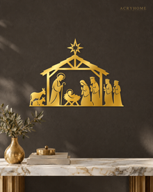 Nativity Stable Wall Art with Star, Kings and Animals in mirror gold acrylic, float-mounted on a deep charcoal wall.