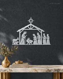 Nativity Stable Wall Art with Star, Kings and Animals in mirror silver acrylic, float-mounted on a deep graphite wall.