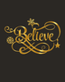 Believe in ornate flowing script with snowflake and flourish detail, laser-cut from mirror gold acrylic and float-mounted on a pale wall.
