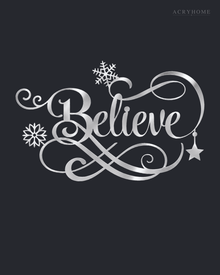Believe in ornate flowing script with snowflake and flourish detail, laser-cut from mirror silver acrylic and float-mounted over a mantel.