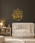 Kamal lotus wall art in mirror gold acrylic — the Hindi word Kamal beneath a stylised lotus inside a vine-and-leaf arch, float-mounted and catching warm light