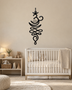 Unalome and lotus line wall art in gloss piano black acrylic, float-mounted on a pale wall.