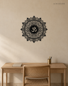 Om lotus mandala acrylic wall art in gloss piano black, float-mounted on a light ivory wall